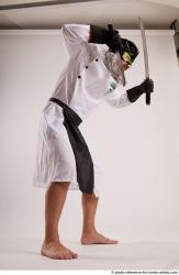 Brono STANDING POSE WITH KATANA AND DAGGER